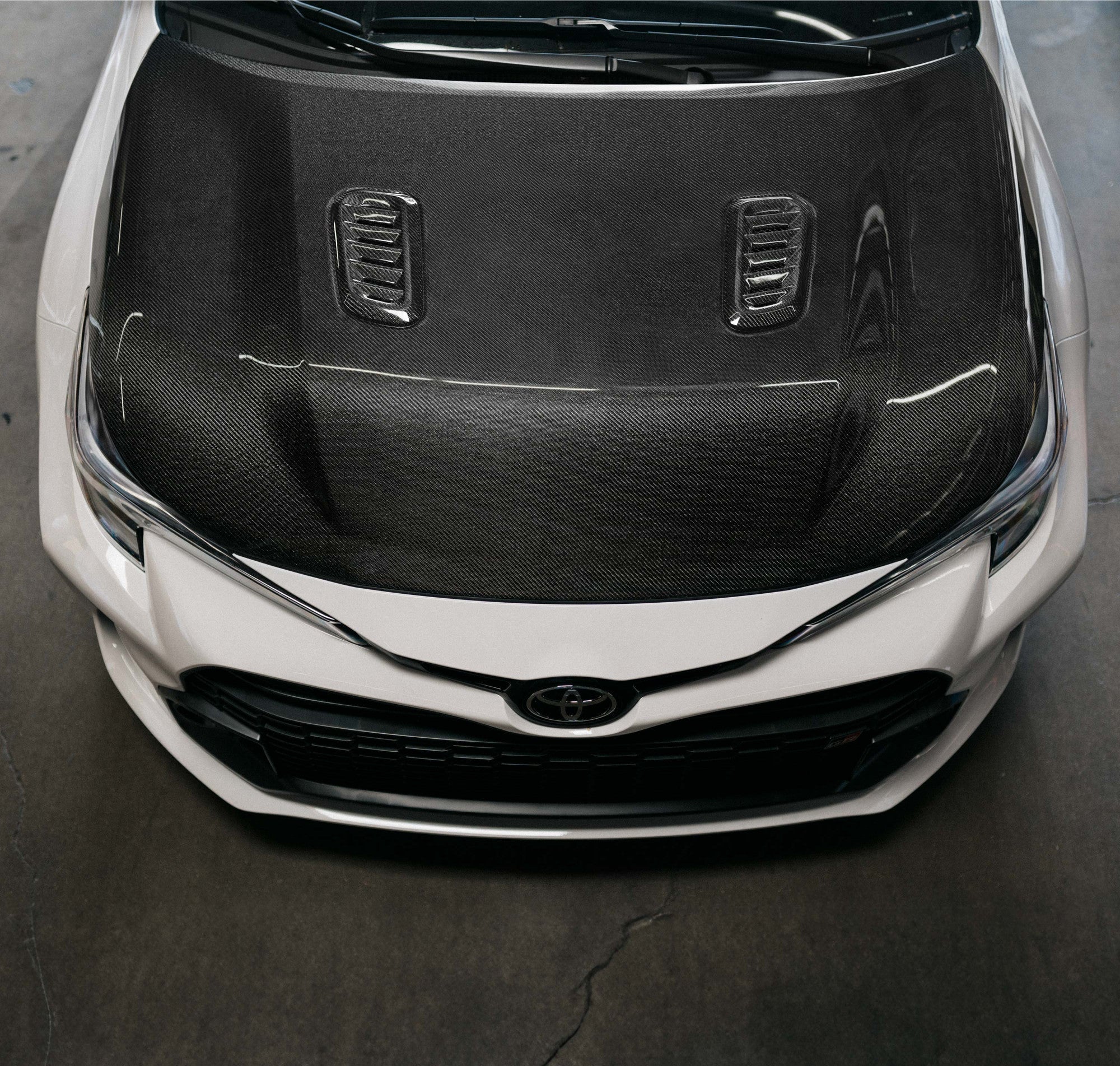Seibon 23-24 Toyota GR Corolla OE-Style Double-Sided Carbon Fiber Hood