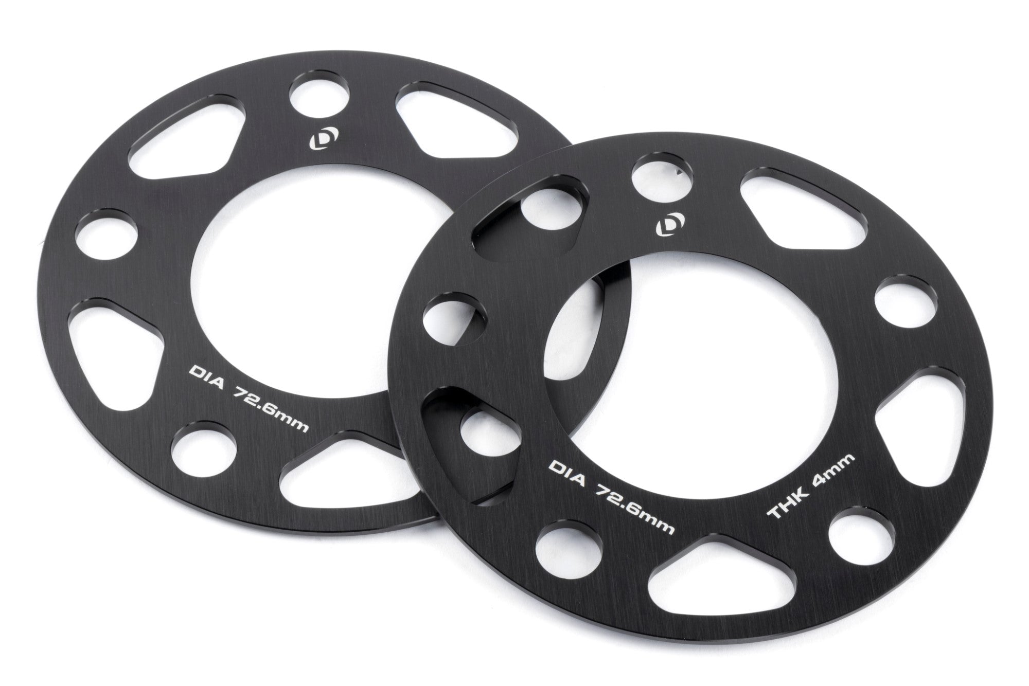 Set of 2 DINAN 5x120 Wheel Spacers in black anodized aluminum, offering improved wheel offset and brake caliper clearance.