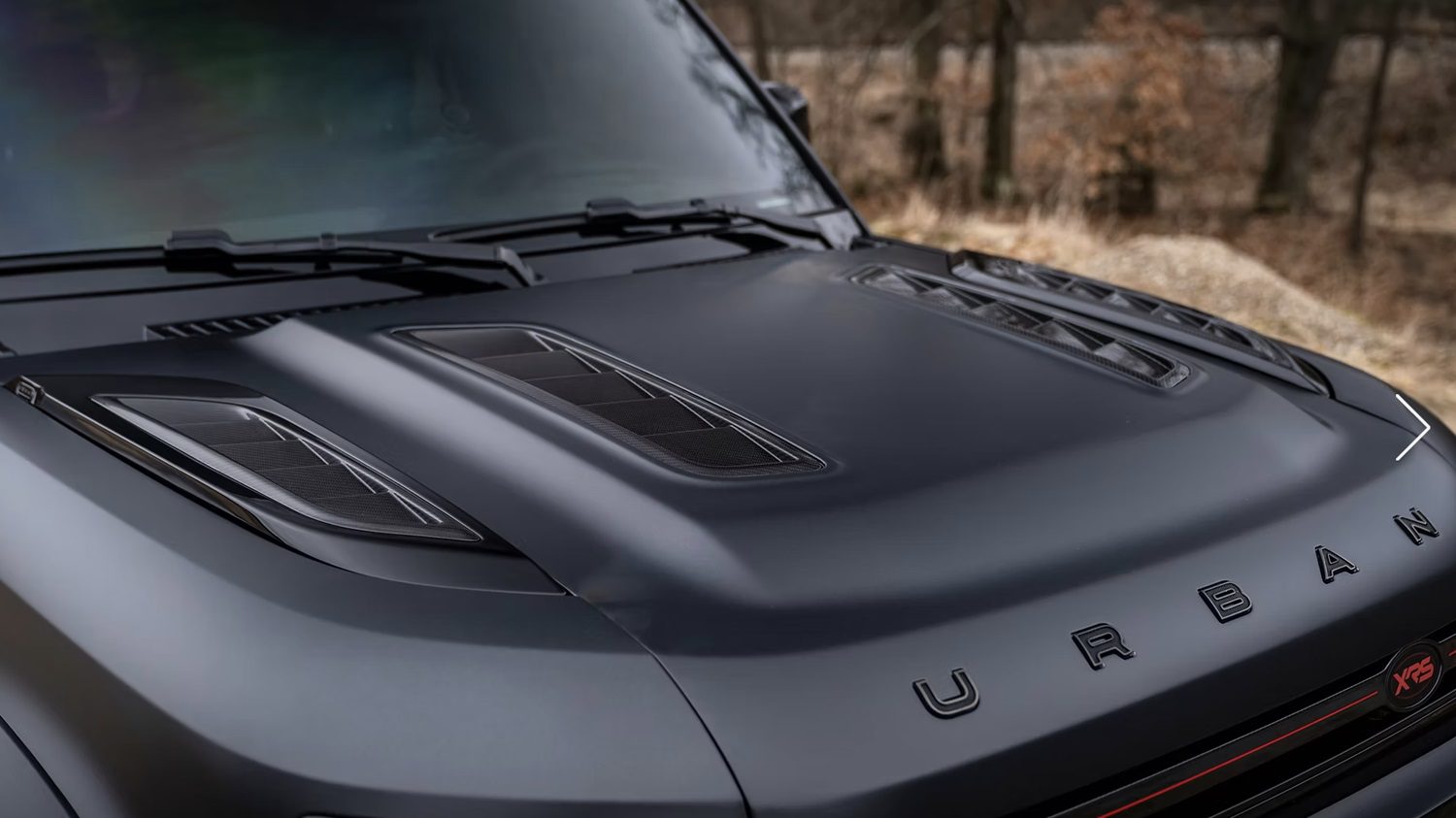 Urban Automotive Defender XRS Semi-Visual Carbon Fiber Quad Vented Bonnet