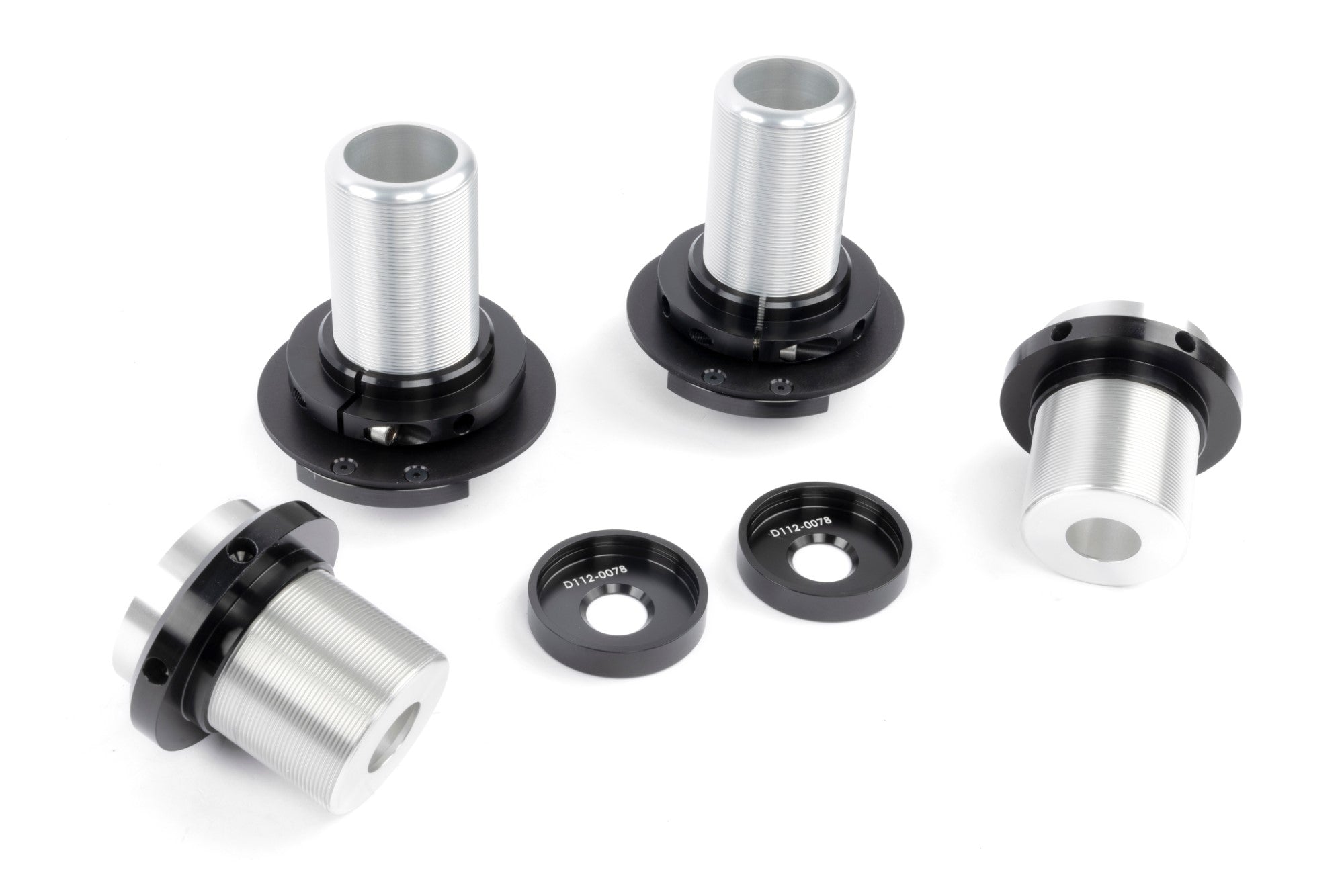 DINAN adjustable coilovers for BMW G87 M2, offering improved handling, reduced dive and squat, and enhanced ride comfort.