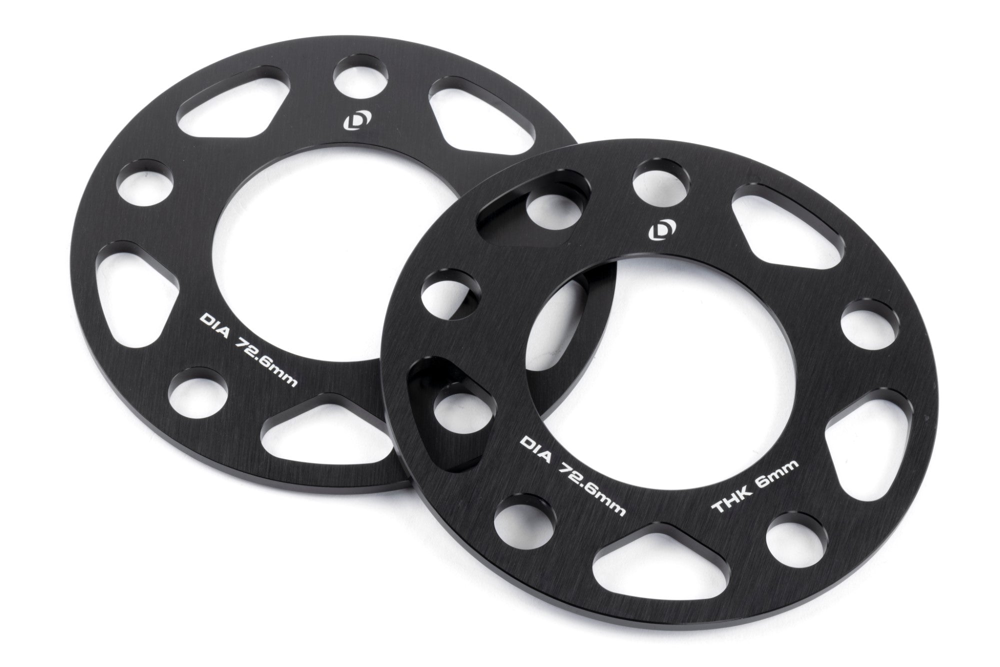 DINAN 5x120 Wheel Spacers in CNC-machined aluminum, offering precise fitment with extended bolt requirements for added safety.