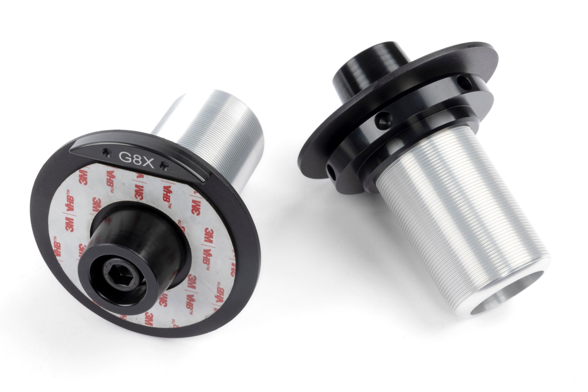 Black anodized DINAN coilover suspension system for BMW G87 M2, engineered for better predictability and compliance at high speeds.