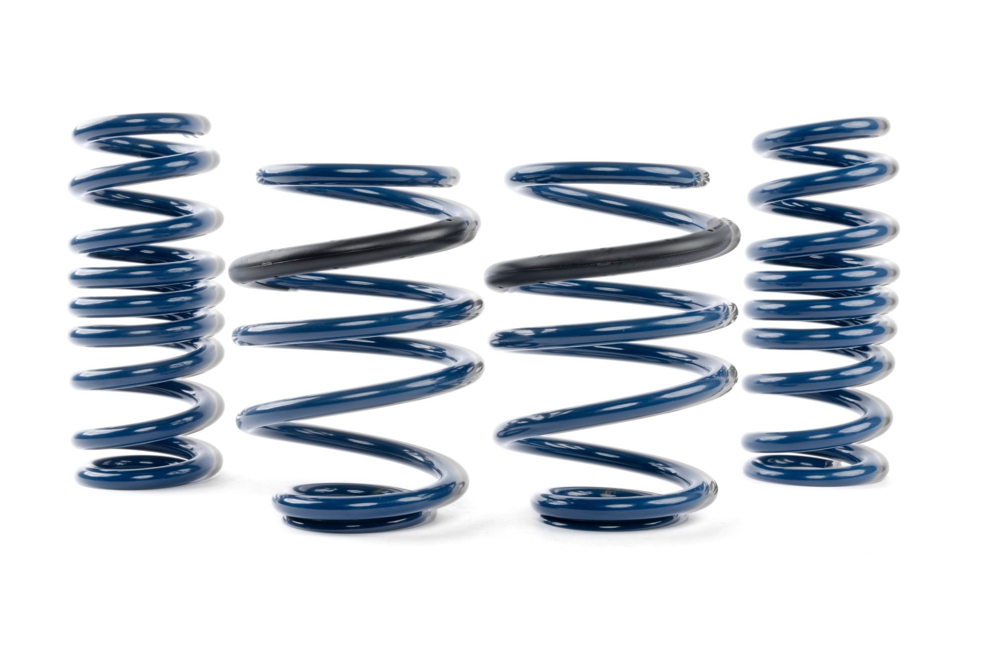 Adjustable DINAN coilovers for BMW G87 M2, designed for reduced body roll and better rear grip with dual rate spring setup.